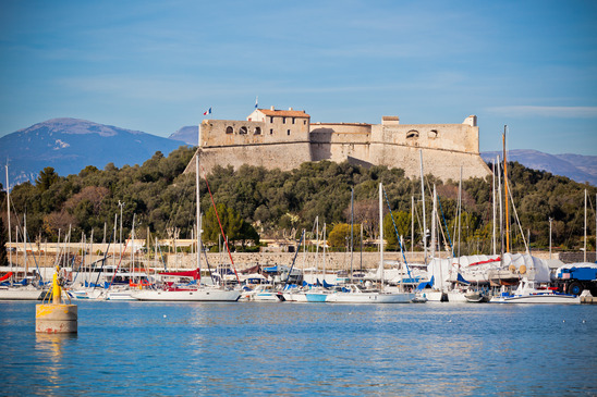 Antibes harbor, France, with yachts and Fort Carre